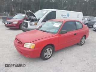 2002 Hyundai Accent GS z VIN KMHCG35C32U157056, wystawiony jako IAAI lot #41538381 z przebiegiem 127 518 mil mil oraz . Historia ofert i sprzedaży dostępna na DreamBid. Obrazek 2.