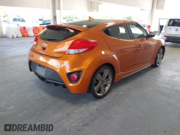 ✅ 2013 Hyundai Veloster Turbo • VIN: KMHTC6AE2DU178083 • Lot: 43039378. Wystawiony na IAAI z przebiegiem 126 260 mil. Bezpłatny archiwum sprzedaży aukcyjnych z USA i szczegółowy raport historii pojazdu na DreamBid. Zdjęcie 4.