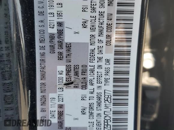 ✅ 2020 Mazda 3 Select • VIN: 3MZBPBCM7LM125977 • Lot: 59440065. Listed on Copart with 86,458 mi. Free auction sales archive from the USA and detailed vehicle history report at DreamBid. Image 12.