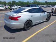 ✅ 2017 Nissan Maxima Platinum • VIN: 1N4AA6AP0HC405145 • Lot: 42579108. Listed on IAAI with 138,114 mi. Free auction sales archive from the USA and detailed vehicle history report at DreamBid. Image 4.