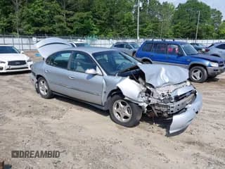 ✅ 1999 Ford Taurus SE • VIN: 1FAFP53SXXA231028 • Lot: 42440415. Listed on IAAI with 85,297 mi. Free auction sales archive from the USA and detailed vehicle history report at DreamBid. Image 1.