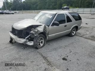 ✅ 2004 Chevrolet Blazer LS • VIN: 1GNCS18X74K157511 • Lot: 65042754. Listed on Copart with Not provided. Free auction sales archive from the USA and detailed vehicle history report at DreamBid. Image 1.