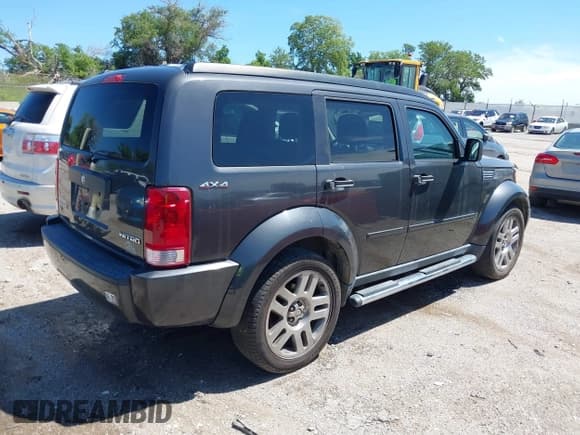 ✅ 2011 Dodge Nitro Heat • VIN: 1D4PU4GX9BW506698 • Lot: 42690394. Listed on IAAI with 159,687 mi. Free auction sales archive from the USA and detailed vehicle history report at DreamBid. Image 4.