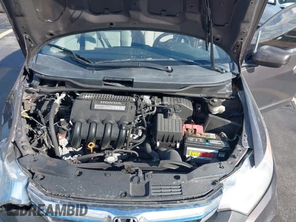 ✅ 2013 Honda Insight LX • VIN: JHMZE2H58DS001247 • Lot: 43801615. Listed on IAAI with 113,454 mi. Free auction sales archive from the USA and detailed vehicle history report at DreamBid. Image 10.