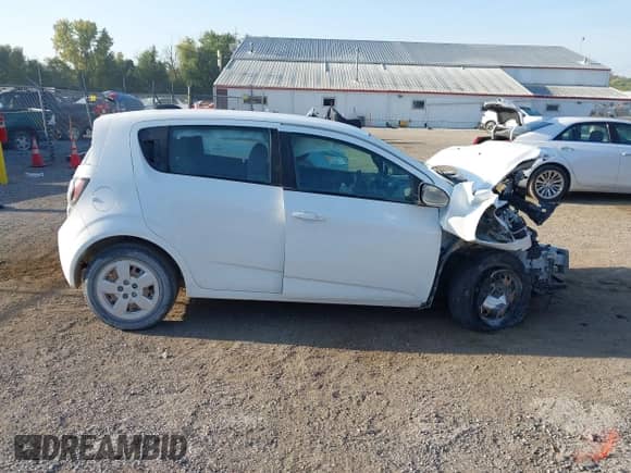 ✅ 2015 Chevrolet Sonic LS • VIN: 1G1JA6SG1F4184471 • Лот: 43340491. Размещён на IAAI с пробегом Не указан миль. Получите бесплатный доступ к архиву аукционных продаж из США и посмотрите подробный отчёт об истории автомобиля на DreamBid. Изображение 14.