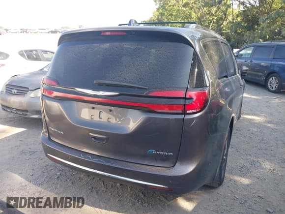 ✅ 2021 Chrysler Pacifica Hybrid Touring L • VIN: 2C4RC1L79MR602839 • Лот: 42745473. Опубликован ранее на IAAI с пробегом 101 174 миль. Бесплатный доступ к архиву аукционных продаж из США и подробный отчёт об истории автомобиля на DreamBid. Изображение 4.