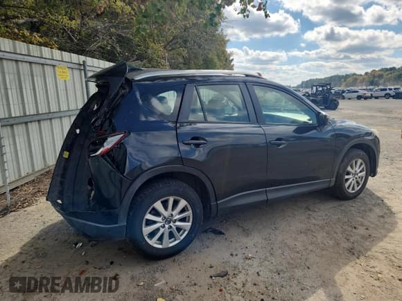 ✅ 2016 Mazda CX-5 Sport • VIN: JM3KE2BY4G0702168 • Лот: 91581085. Опубликован ранее на Copart с пробегом 318 805 миль. Бесплатный доступ к архиву аукционных продаж из США и подробный отчёт об истории автомобиля на DreamBid. Изображение 3.