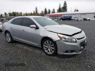 ✅ 2015 Chevrolet Malibu LTZ • VIN: 1G11F5SL3FF282110 • Lot: 43516279. Listed on IAAI with 131,961 mi. Free auction sales archive from the USA and detailed vehicle history report at DreamBid. Image 1.
