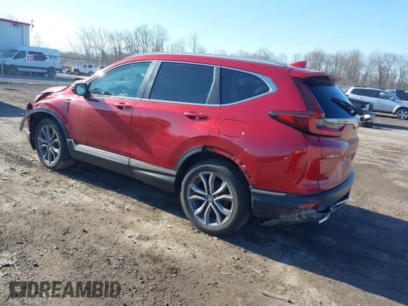 ✅ 2021 Honda CR-V Touring • VIN: 7FART6H9XME003424 • Lot: 42030168. Listed on IAAI with 86,299 mi. Free auction sales archive from the USA and detailed vehicle history report at DreamBid. Image 3.