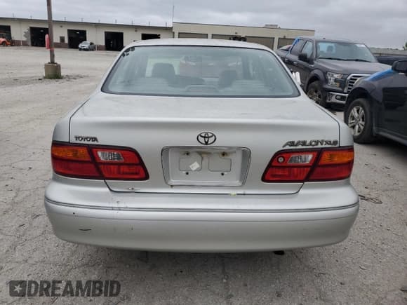 ✅ 1999 Toyota Avalon XL • VIN: 4T1BF18B8XU336447 • Лот: 69674675. Опубликован ранее на Copart с пробегом 200 441 миль. Бесплатный доступ к архиву аукционных продаж из США и подробный отчёт об истории автомобиля на DreamBid. Изображение 6.