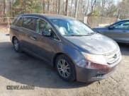 ✅ 2012 Honda Odyssey EX-L • VIN: 5FNRL5H66CB130892 • Lot: 43795563. Listed on IAAI with 155,722 mi. Free auction sales archive from the USA and detailed vehicle history report at DreamBid. Image 1.