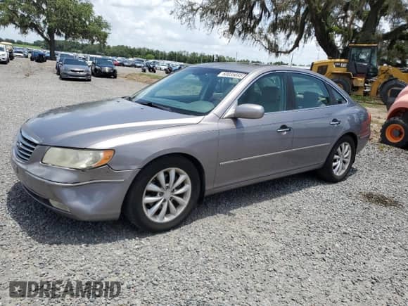 2007 Hyundai Azera SE с VIN KMHFC46FX7A216846, выставлен на аукционе Copart как лот 60035695 с пробегом 197 201 миль миль и Списание • Salvage title. История ставок и продаж доступна на DreamBid. Изображение 1.