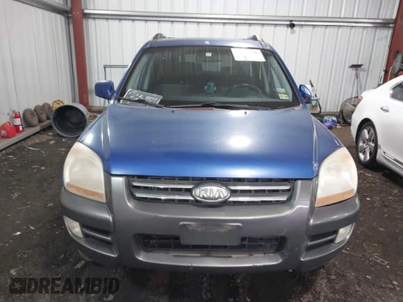 ✅ 2005 Kia Sportage LX • VIN: KNDJE723757109849 • Lot: 41505516. Listed on IAAI with 243,556 mi. Free auction sales archive from the USA and detailed vehicle history report at DreamBid. Image 6.