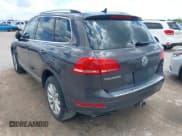 ✅ 2012 Volkswagen Touareg Lux • VIN: WVGEF9BP5CD010017 • Lot: 42374163. Listed on IAAI with 183,950 mi. Free auction sales archive from the USA and detailed vehicle history report at DreamBid. Image 3.