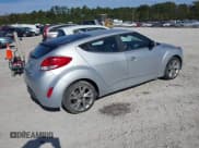 ✅ 2017 Hyundai Veloster Value Edition • VIN: KMHTC6ADXHU307359 • Lot: 43702500. Wystawiony na IAAI z przebiegiem 107 319 mil. Bezpłatny archiwum sprzedaży aukcyjnych z USA i szczegółowy raport historii pojazdu na DreamBid. Zdjęcie 4.