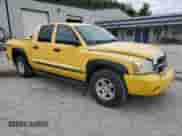2006 Dodge Dakota SLT с VIN 1D7HW48N26S561263, выставлен на аукционе Copart как лот 68012204 с пробегом 141 041 миль миль и Списание • Salvage title. История ставок и продаж доступна на DreamBid. Изображение 4.