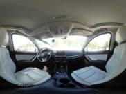 ✅ 2016 Mazda CX-5 Grand Touring • VIN: JM3KE2DY7G0782899 • Lot: 42949510. Wystawiony na IAAI z przebiegiem 85 502 mil. Bezpłatny archiwum sprzedaży aukcyjnych z USA i szczegółowy raport historii pojazdu na DreamBid. Zdjęcie 18.