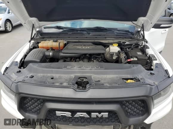 2020 Ram 1500 Rebel z VIN 1C6SRFLM1LN230872, wystawiony jako Copart lot #55671585 z przebiegiem 97 202 mil mil oraz Szkoda całkowita • Salvage title. Historia ofert i sprzedaży dostępna na DreamBid. Obrazek 11.