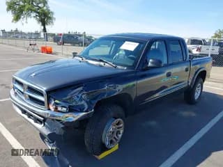 ✅ 2002 Dodge Dakota SLT • VIN: 1B7HG48N82S634864 • Lot: 41839572. Wystawiony na IAAI z przebiegiem 138 557 mil. Bezpłatny archiwum sprzedaży aukcyjnych z USA i szczegółowy raport historii pojazdu na DreamBid. Zdjęcie 2.