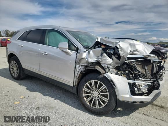 ✅ 2019 Cadillac XT5 Luxury FWD • VIN: 1GYKNCRS5KZ192590 • Lot: 85743525. Listed on Copart with 90,754 mi. Free auction sales archive from the USA and detailed vehicle history report at DreamBid. Image 4.