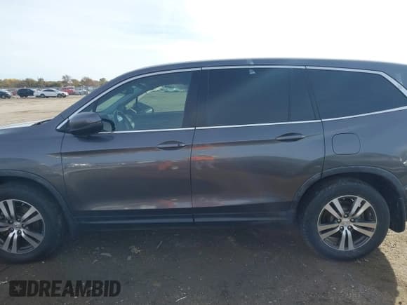 ✅ 2016 Honda Pilot EX-L • VIN: 5FNYF5H67GB006722 • Лот: 41023005. Опубликован ранее на IAAI с пробегом 126 450 миль. Бесплатный доступ к архиву аукционных продаж из США и подробный отчёт об истории автомобиля на DreamBid. Изображение 14.