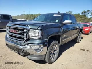✅ 2017 GMC Sierra 1500 SLT • VIN: 3GTU2NEC2HG270463 • Lot: 91568555. Listed on Copart with 127,936 mi. Free auction sales archive from the USA and detailed vehicle history report at DreamBid. Image 1.