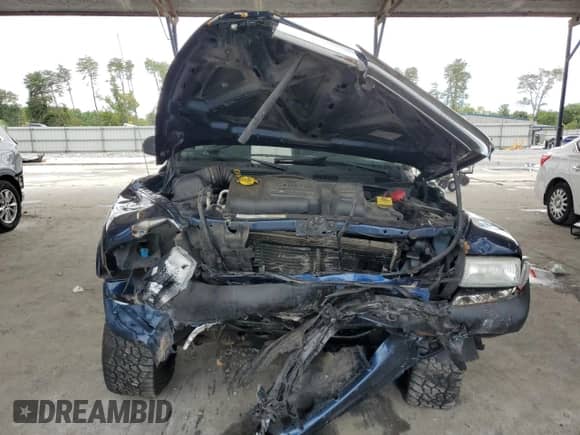 2004 Dodge Dakota Sport с VIN 1D7HG38N14S510552, выставлен на аукционе Copart как лот 63930474 с пробегом 111 011 миль миль и Списание • Salvage title. История ставок и продаж доступна на DreamBid. Изображение 5.