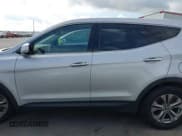 ✅ 2014 Hyundai Santa Fe • VIN: 5XYZT3LB1EG162718 • Лот: 43236826. Опубликован ранее на IAAI с пробегом 197 087 миль. Бесплатный доступ к архиву аукционных продаж из США и подробный отчёт об истории автомобиля на DreamBid. Изображение 13.