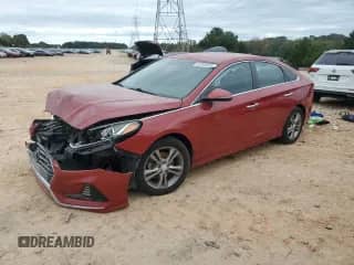 2018 Hyundai Sonata SEL with VIN 5NPE34AF6JH631802, listed as a Copart auction lot 82303035 with 127,637 mi miles and Salvage title. Bid and sale history available at DreamBid. Image 1.