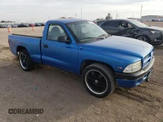 ✅ 1999 Dodge Dakota SLT • VIN: 1B7FL26X7XS241330 • Lot: 78123864. Wystawiony na Copart z przebiegiem 218 849 mil. Bezpłatny archiwum sprzedaży aukcyjnych z USA i szczegółowy raport historii pojazdu na DreamBid. Zdjęcie 4.