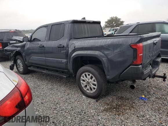 ✅ 2025 Toyota Tacoma SR • VIN: 3TYKD5HN4ST028589 • Lot: 90097295. Listed on Copart with 12,016 mi. Free auction sales archive from the USA and detailed vehicle history report at DreamBid. Image 2.