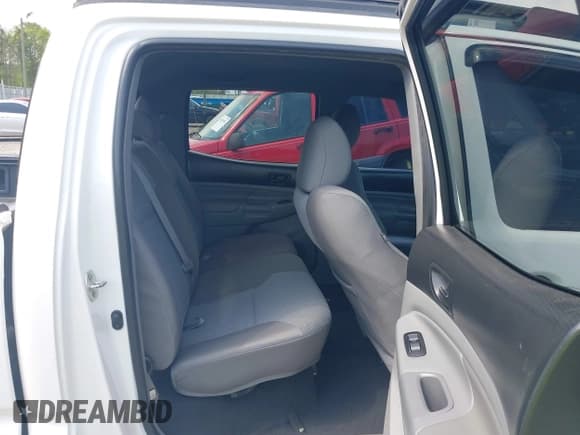 ✅ 2012 Toyota Tacoma • VIN: 3TMMU4FN9CM040840 • Lot: 42009044. Listed on IAAI with 241,714 mi. Free auction sales archive from the USA and detailed vehicle history report at DreamBid. Image 8.