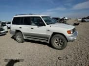 ✅ 1998 Mitsubishi Montero • VIN: JA4MR51R6WJ002639 • Lot: 82756475. Wystawiony na Copart z przebiegiem 234 948 mil. Bezpłatny archiwum sprzedaży aukcyjnych z USA i szczegółowy raport historii pojazdu na DreamBid. Zdjęcie 14.