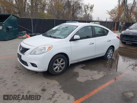 ✅ 2012 Nissan Versa SV • VIN: 3N1CN7AP5CL909221 • Лот: 43763639. Опубликован ранее на IAAI с пробегом 127 193 миль. Бесплатный доступ к архиву аукционных продаж из США и подробный отчёт об истории автомобиля на DreamBid. Изображение 2.