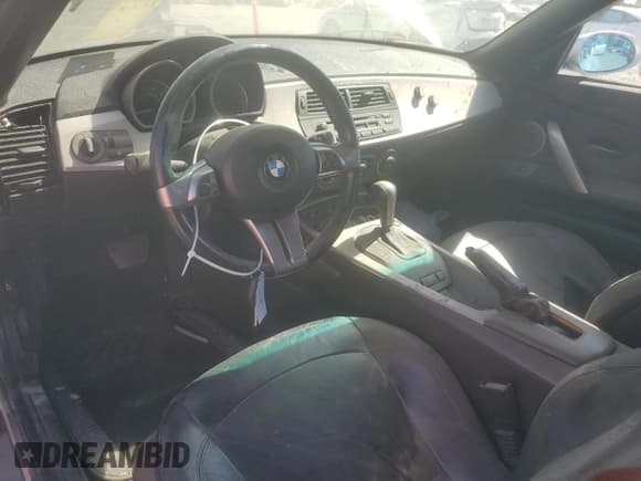 ✅ 2004 BMW Z4 3.0i • VIN: 4USBT53594LU07477 • Lot: 65718545. Listed on Copart with 124,545 mi. Free auction sales archive from the USA and detailed vehicle history report at DreamBid. Image 8.