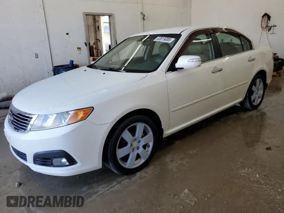 ✅ 2009 Kia Optima EX • VIN: KNAGE228295323493 • Lot: 83819085. Listed on Copart with 126,975 mi. Free auction sales archive from the USA and detailed vehicle history report at DreamBid. Image 1.