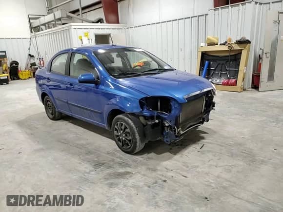 2011 Chevrolet Aveo 1LT z VIN KL1TD5DEXBB140334, wystawiony jako Copart lot #41641515 z przebiegiem 52 399 mil mil oraz Szkoda całkowita • Salvage title. Historia ofert i sprzedaży dostępna na DreamBid. Obrazek 11.