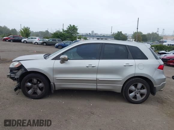 ✅ 2009 Acura RDX Technology • VIN: 5J8TB18569A007802 • Lot: 43193645. Listed on IAAI with 164,034 mi. Free auction sales archive from the USA and detailed vehicle history report at DreamBid. Image 15.