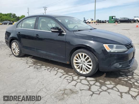 ✅ 2014 Volkswagen Jetta SEL • VIN: 3VWL17AJXEM427214 • Lot: 54179655. Listed on Copart with 168,516 mi. Free auction sales archive from the USA and detailed vehicle history report at DreamBid. Image 4.