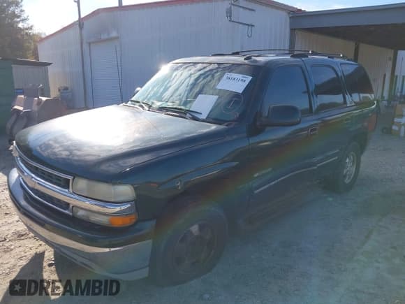 ✅ 2003 Chevrolet Tahoe LS • VIN: 1GNEC13ZX3J126658 • Lot: 38183198. Listed on IAAI with 451,578 mi. Free auction sales archive from the USA and detailed vehicle history report at DreamBid. Image 2.