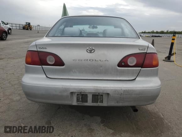 ✅ 2001 Toyota Corolla CE • VIN: 1NXBR12E21Z562307 • Lot: 82405645. Listed on Copart with 280,538 mi. Free auction sales archive from the USA and detailed vehicle history report at DreamBid. Image 6.