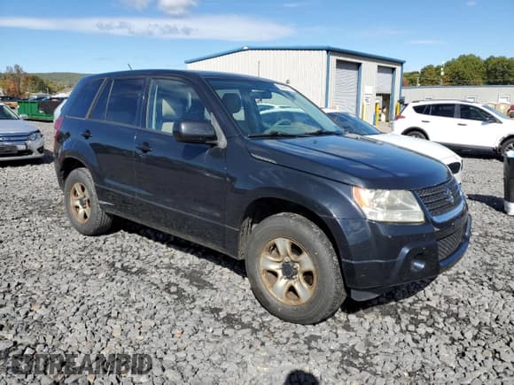 ✅ 2012 Suzuki Grand Vitara Premium • VIN: JS3TD0D27C4100396 • Lot: 82469195. Wystawiony na Copart z przebiegiem 107 769 mil. Bezpłatny archiwum sprzedaży aukcyjnych z USA i szczegółowy raport historii pojazdu na DreamBid. Zdjęcie 4.