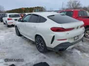 ✅ 2023 BMW X6 M50i • VIN: 5UXCY8C02P9N80310 • Lot: 41619497. Listed on IAAI with 19,686 mi. Free auction sales archive from the USA and detailed vehicle history report at DreamBid. Image 3.