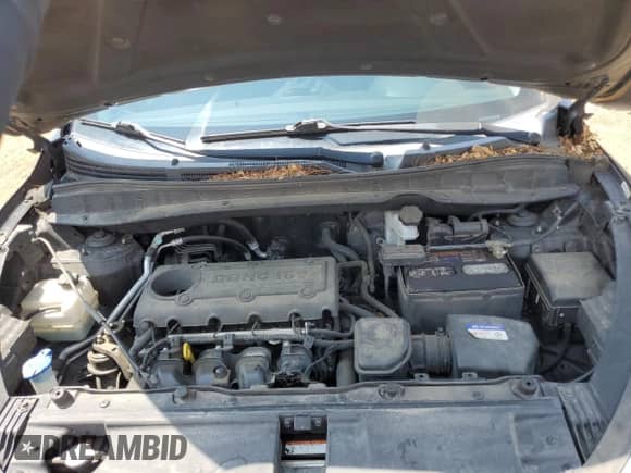 2011 Hyundai Tucson GLS z VIN KM8JUCAC9BU156922, wystawiony jako Copart lot #64274714 z przebiegiem 101 631 mil mil oraz Szkoda całkowita • Salvage title. Historia ofert i sprzedaży dostępna na DreamBid. Obrazek 13.