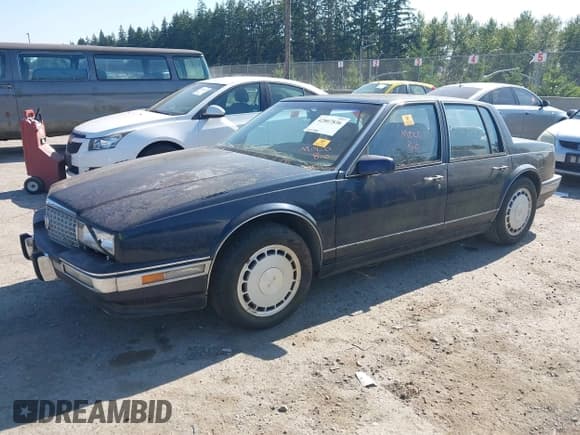 ✅ 1990 Cadillac Seville • VIN: 1G6KY5337LU818314 • Lot: 42807836. Listed on IAAI with 162,743 mi. Free auction sales archive from the USA and detailed vehicle history report at DreamBid. Image 2.