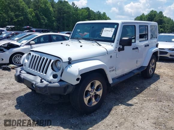 ✅ 2018 Jeep Wrangler Unlimited Sahara • VIN: 1C4BJWEG3JL805263 • Lot: 42593276. Listed on IAAI with 96,489 mi. Free auction sales archive from the USA and detailed vehicle history report at DreamBid. Image 17.