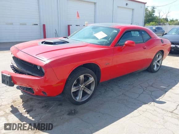 ✅ 2016 Dodge Challenger R/T Plus • VIN: 2C3CDZBT3GH299992 • Lot: 43188443. Listed on IAAI with 57,177 mi. Free auction sales archive from the USA and detailed vehicle history report at DreamBid. Image 2.