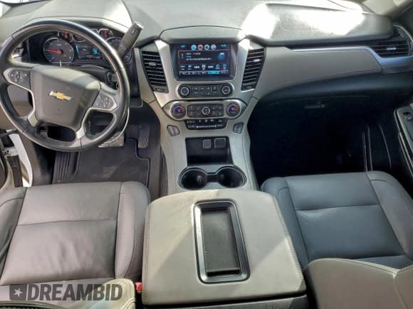 ✅ 2019 Chevrolet Tahoe LT • VIN: 1GNSCBKCXKR180967 • Lot: 94340365. Listed on Copart with 107,454 mi. Free auction sales archive from the USA and detailed vehicle history report at DreamBid. Image 8.