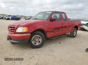 ✅ 2000 Ford F-150 XL • VIN: 1FTZX1722YKA63309 • Лот: 48788275. Опубликован ранее на Copart с пробегом Не указан. Бесплатный доступ к архиву аукционных продаж из США и подробный отчёт об истории автомобиля на DreamBid. Изображение 1.