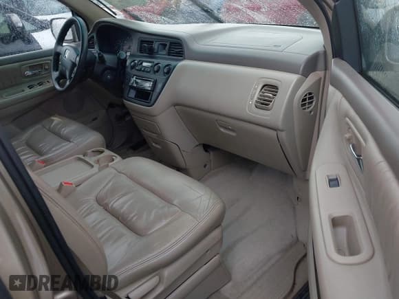 ✅ 2004 Honda Odyssey EX-L • VIN: 5FNRL18914B036407 • Lot: 41939932. Listed on IAAI with 243,790 mi. Free auction sales archive from the USA and detailed vehicle history report at DreamBid. Image 5.